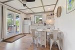 Bright kitchen and dining area in the Navy Cabin