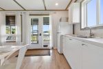 Kitchen view with door leading outside