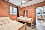 Bedroom with double bed in the Angler’s Cabin
