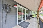 Cabin porch with sliding doors and seating