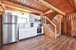 Open-concept kitchen and dining area inside the Lakeview Cabin.