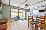 Bright dining area with large windows