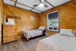 Living room with wood-paneled accent wall