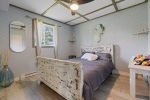 Bedroom with double bed and window view