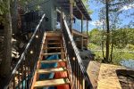 Stairway from Lakeview Cabin deck leading down to the shoreline.