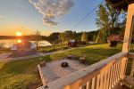 Outdoor firepit seating area overlooking Lac Heney